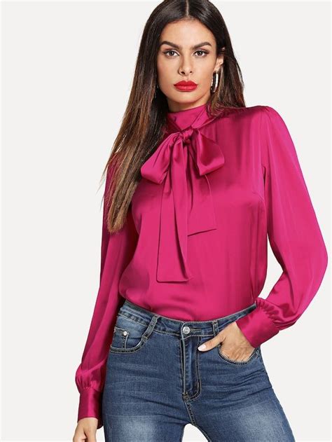 back buttoned tie neck blouse.